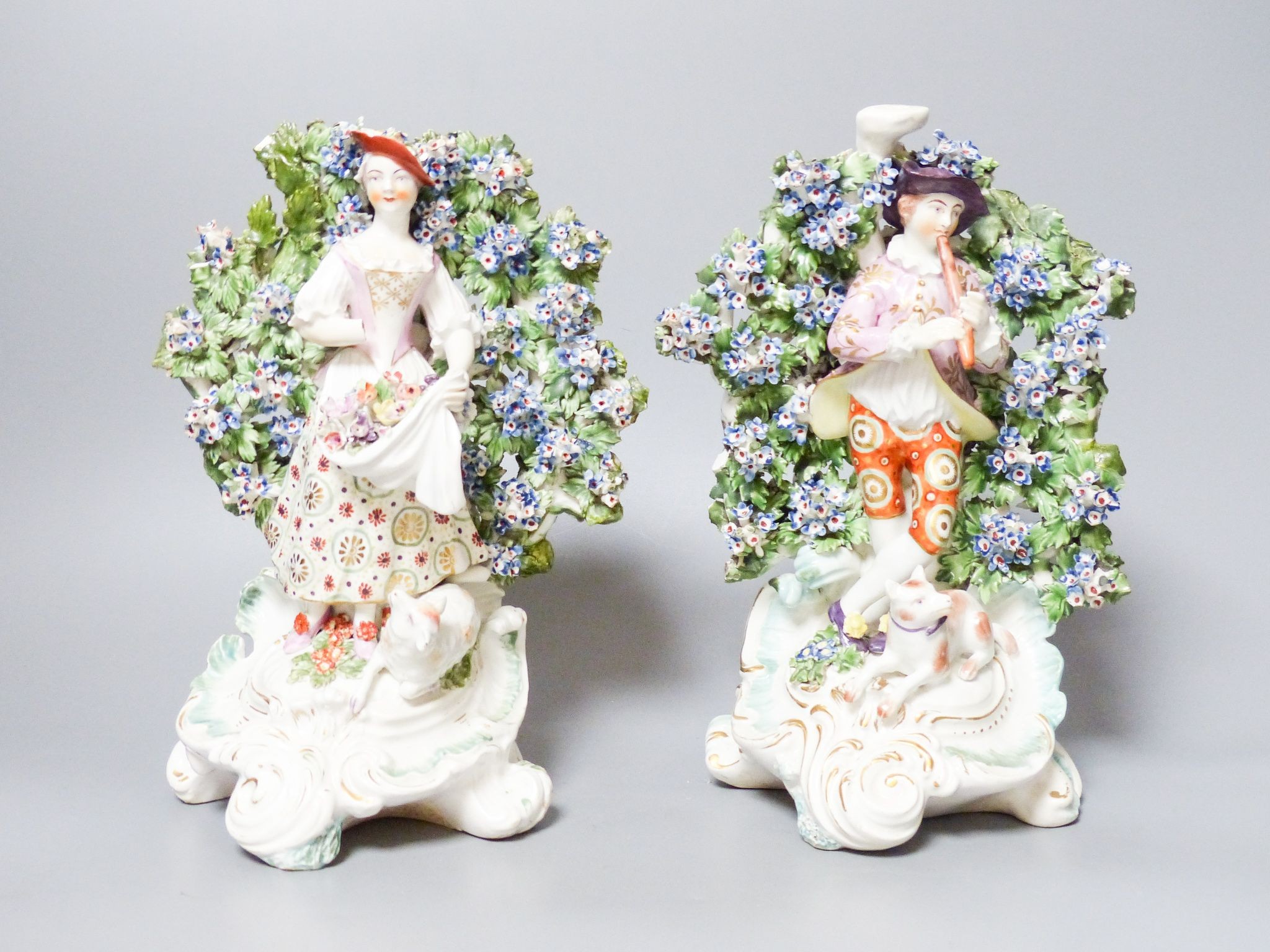 A pair of Derby bocage figures, c.1775, patch marks, 24.5 cm high